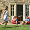 Family using outdoor beanbags