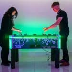 Two players enjoying Neuron Race